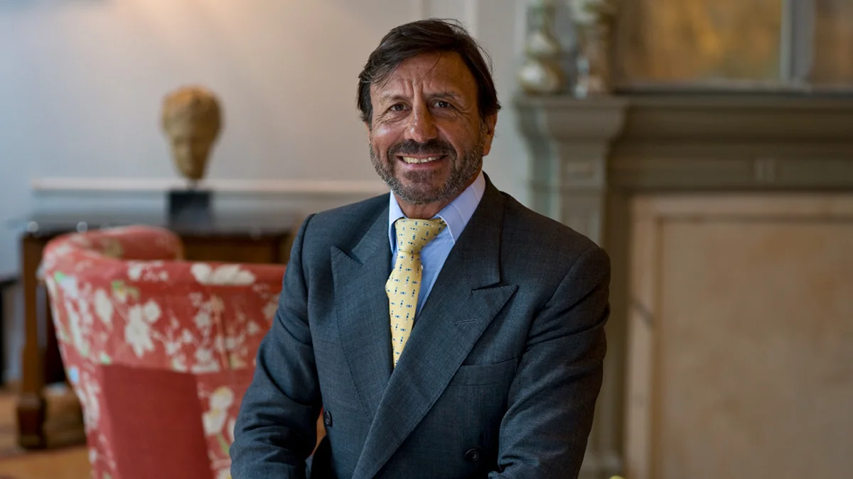 Sir Rocco Forte poses in a suite at Browns Hotel